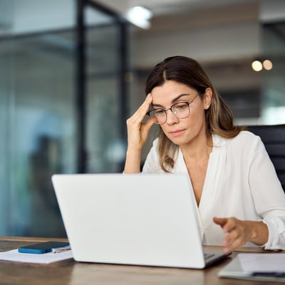 Woman frustrated at her computer